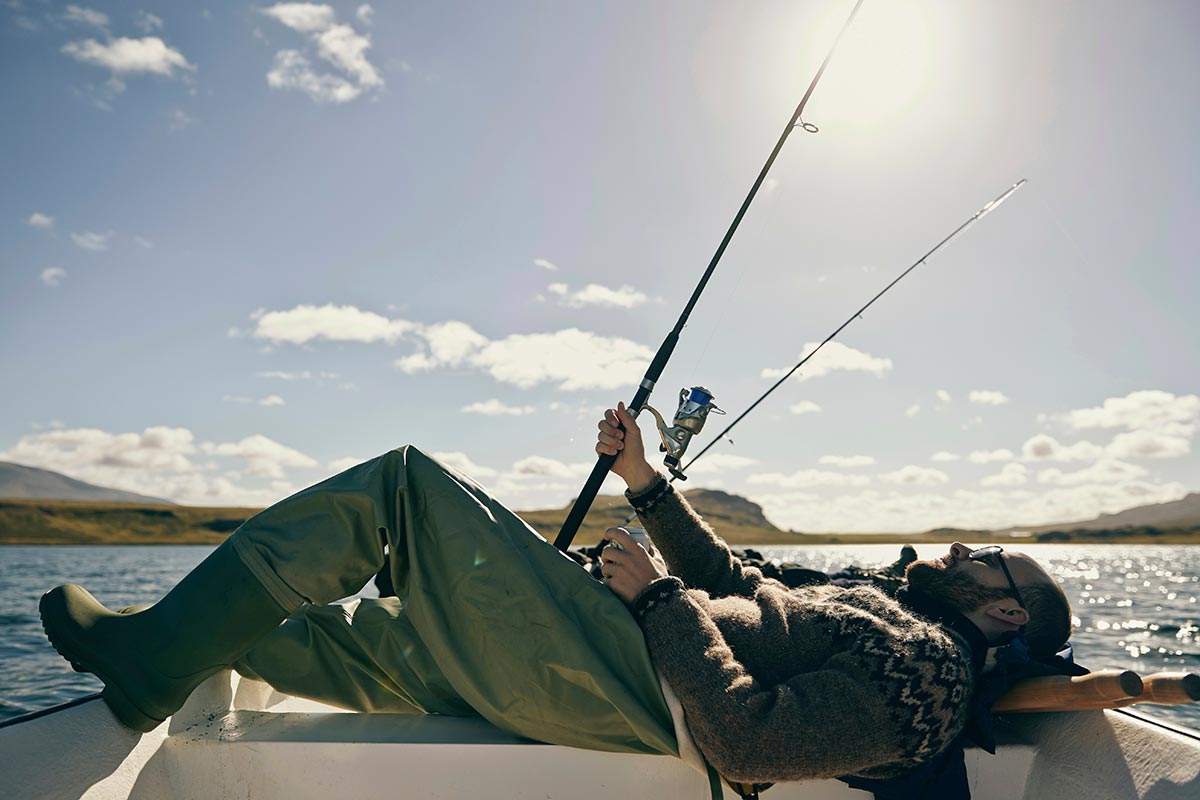 relaxed-fisherman-enjoying-a-sunny-day-on-the-lake-2024-07-09-18-20-21-utc